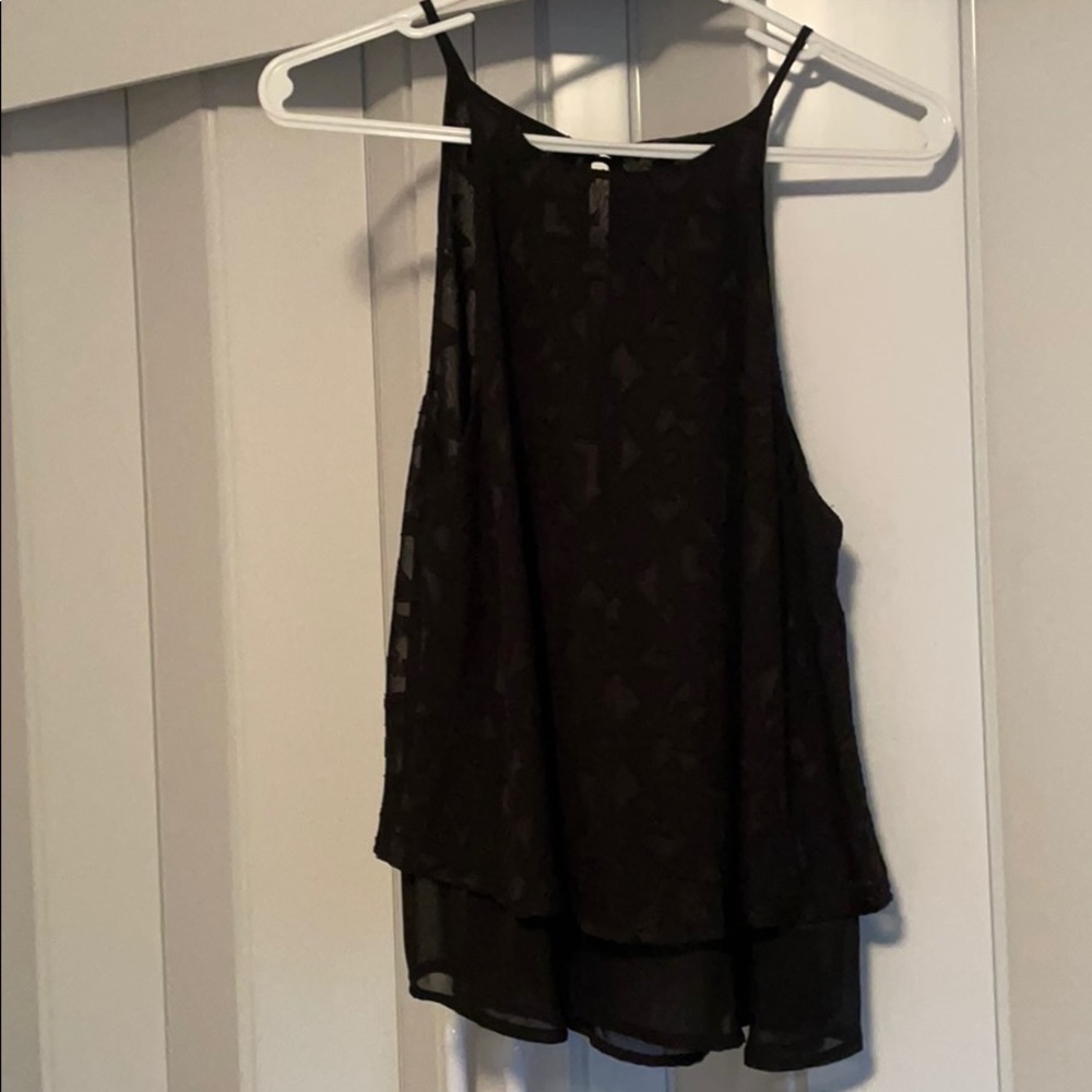 Black sleeveless blouse